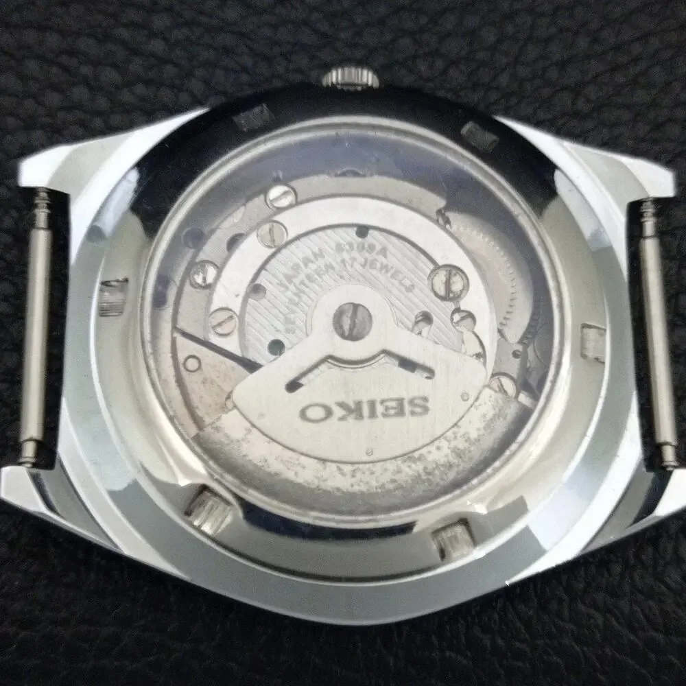 Vintage 1975 Seiko Automatic Mens Silver Watch W/daydate & Blue accents